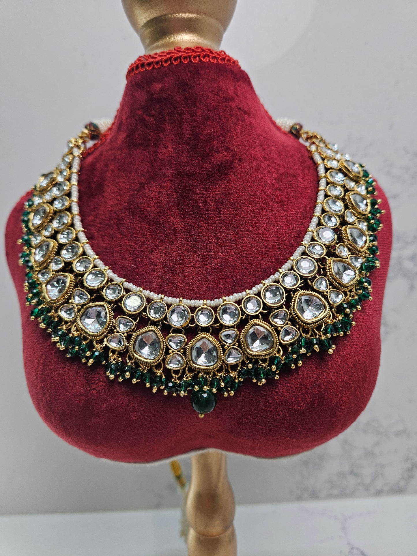 Premium Kundan Necklace Set with Green Gemstones